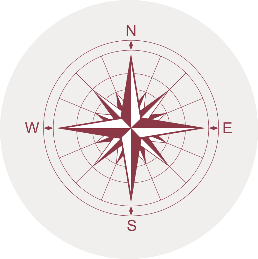 Gray circular icon with an illustrated compass face showing North, South, West and East.