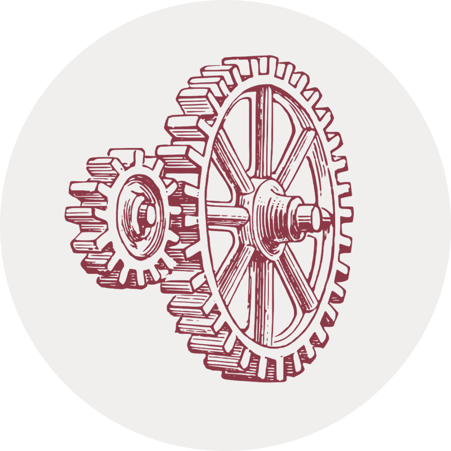 Gray circle with illustration of interlocking gears